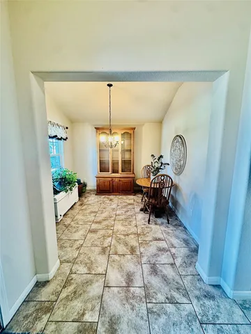 a bed room with a bed and a mirror