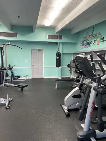 a gym room with gym equipment