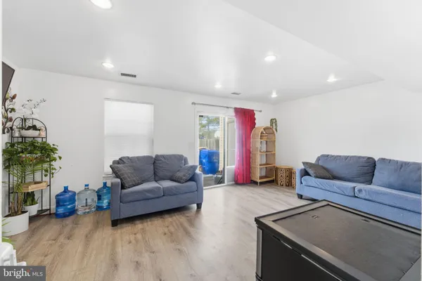 a living room with furniture and a couch