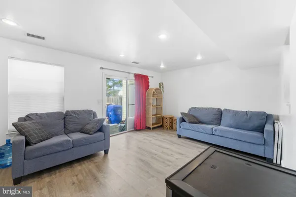 a living room with furniture and a couch