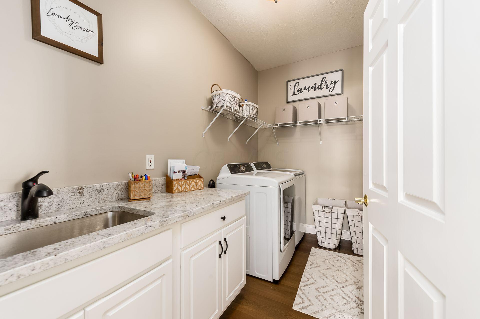 2349 Rufus Court Lewis Center, OH 43035 - Photo 17 of 48 Just off the kitchen, you'll love the size of this no pass through laundry room.