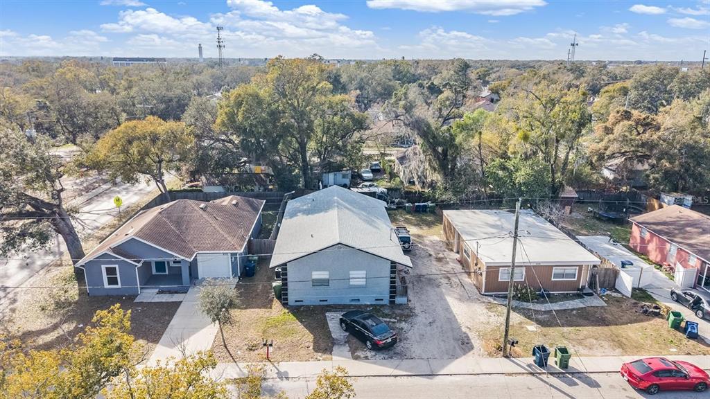 8304 North 13th Street Tampa, FL 33604 - Photo 21 of 22 an aerial view of a house with a yard