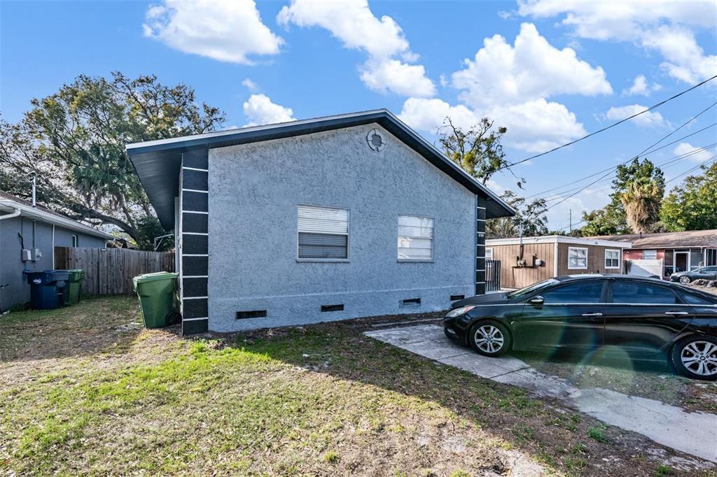 8304 North 13th Street Tampa, FL 33604 - Photo 22 of 22 a view of a house with a yard