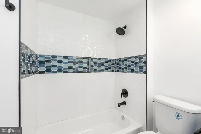 a bathroom with a bathtub