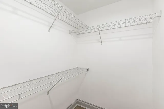 a view of a room with racks on the wall