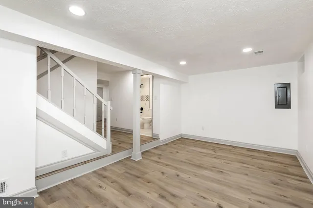 a view of entryway with wooden floor