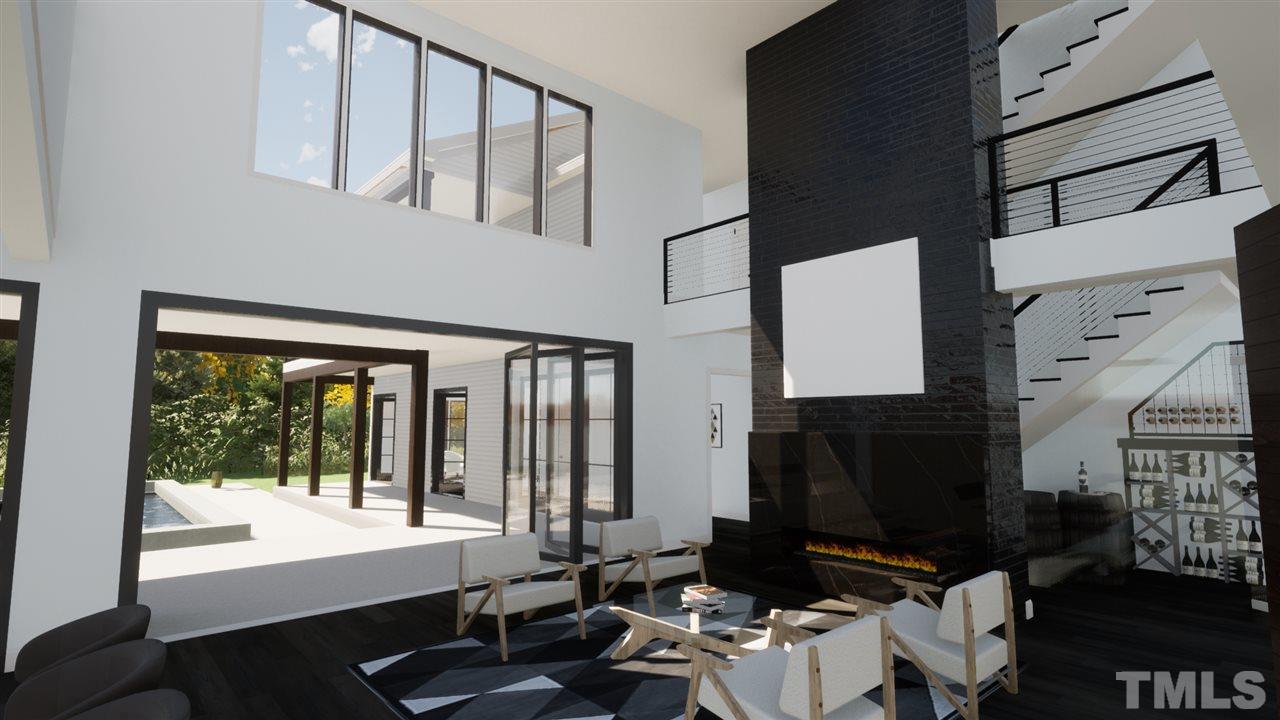 1616 Hunting Ridge Road Raleigh, NC 27615 - Photo 2 of 22 a room with furniture a flat screen tv and a fireplace