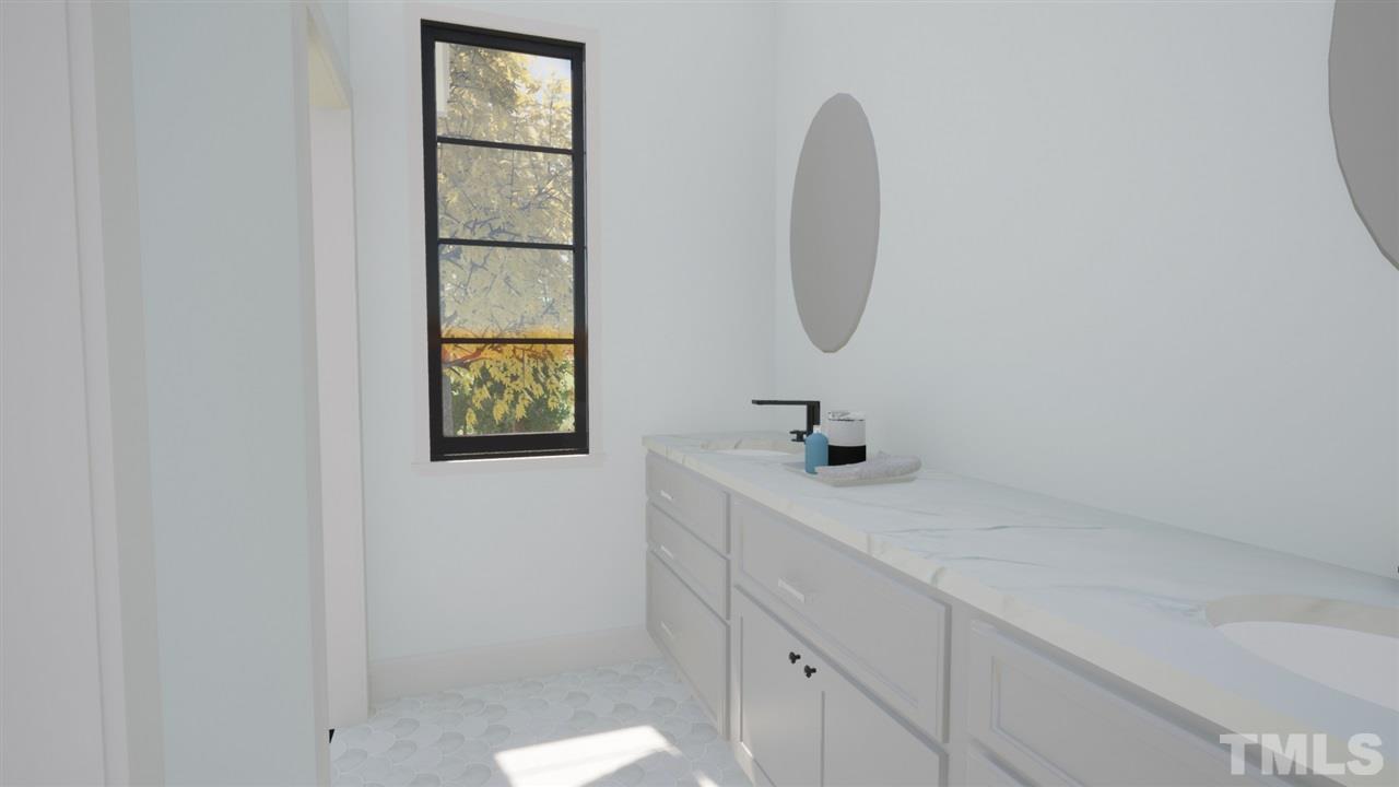1616 Hunting Ridge Road Raleigh, NC 27615 - Photo 11 of 22 a bathroom with a sink and a mirror