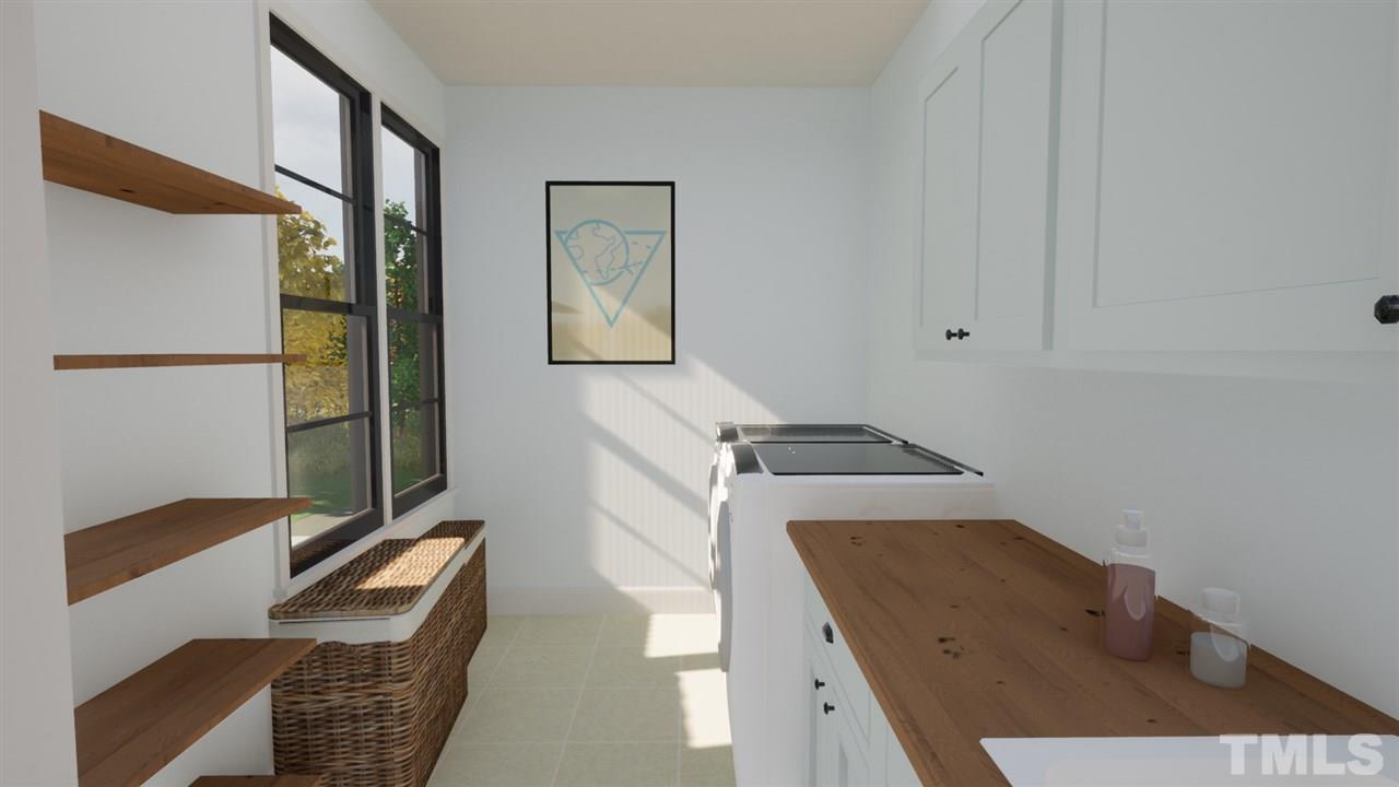 1616 Hunting Ridge Road Raleigh, NC 27615 - Photo 17 of 22 a bedroom with a bed and a window