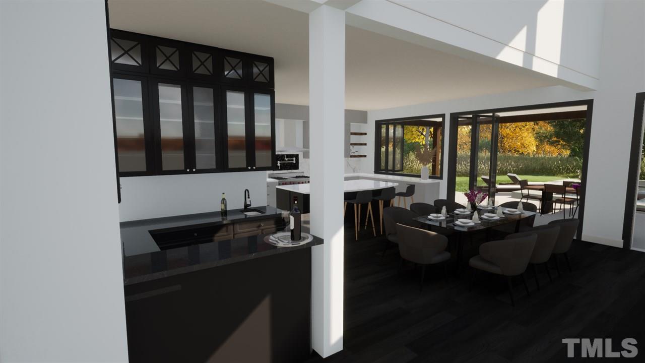 1616 Hunting Ridge Road Raleigh, NC 27615 - Photo 3 of 22 a kitchen with sink and view of living room