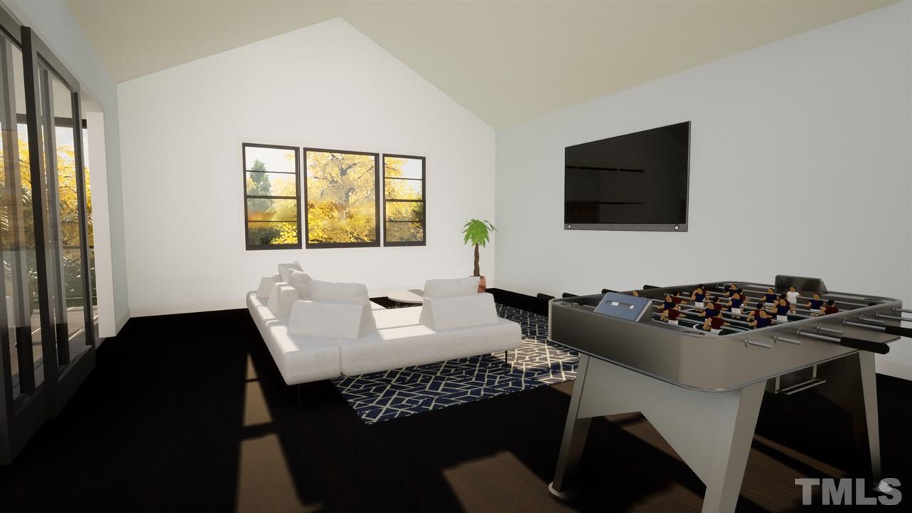 1616 Hunting Ridge Road Raleigh, NC 27615 - Photo 8 of 22 a living room with furniture window and a flat screen tv