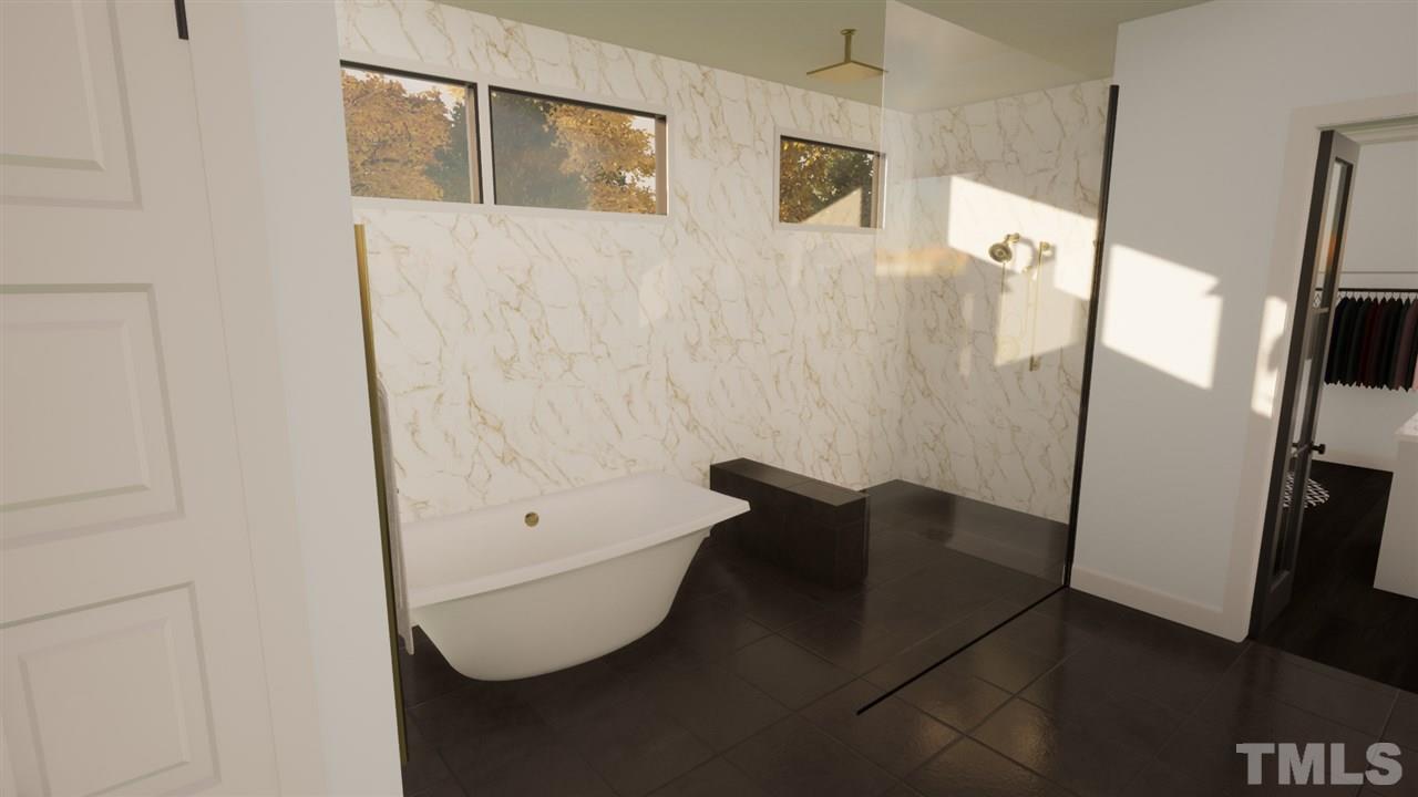 1616 Hunting Ridge Road Raleigh, NC 27615 - Photo 9 of 22 a bathroom with a bathtub