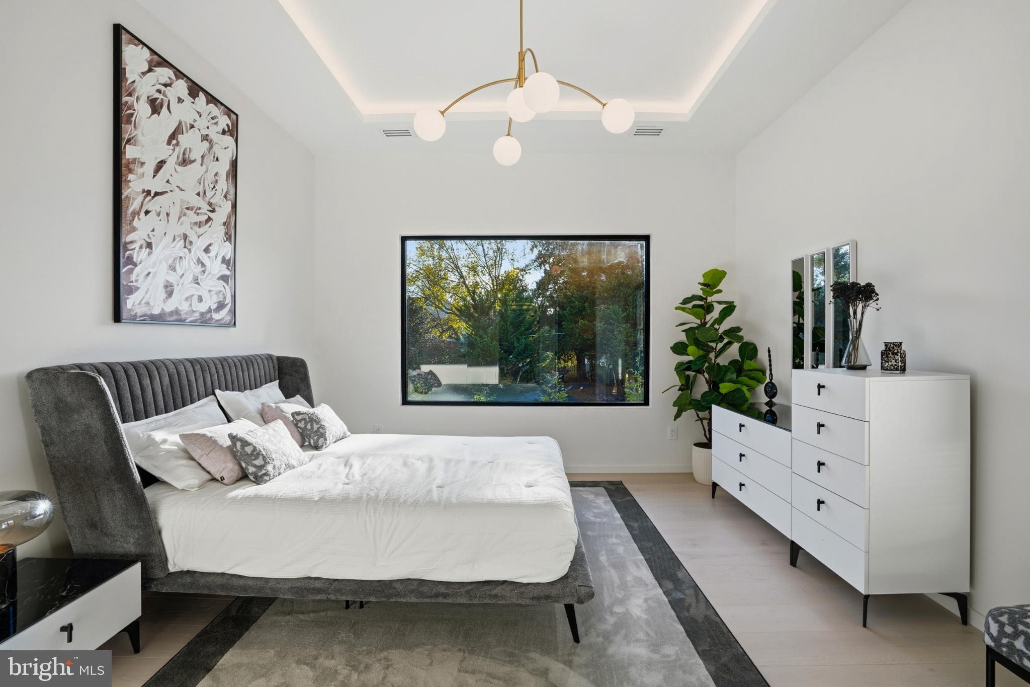 9408 Old Courthouse Road Vienna, VA 22182 - Photo 64 of 92 Serene bedroom with modern elegance.