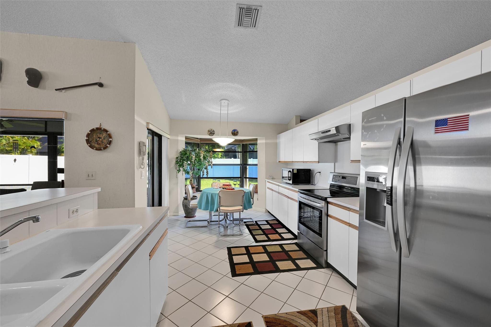 7312 Northwest 83rd Way Tamarac, FL 33321 - Photo 4 of 21 Eat-in Kitchen