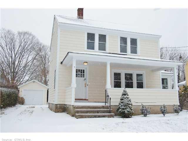 a black and white photo of a house