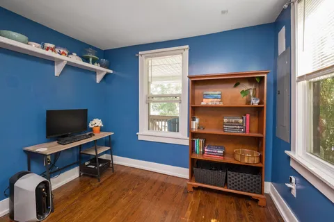 a room with furniture and a window