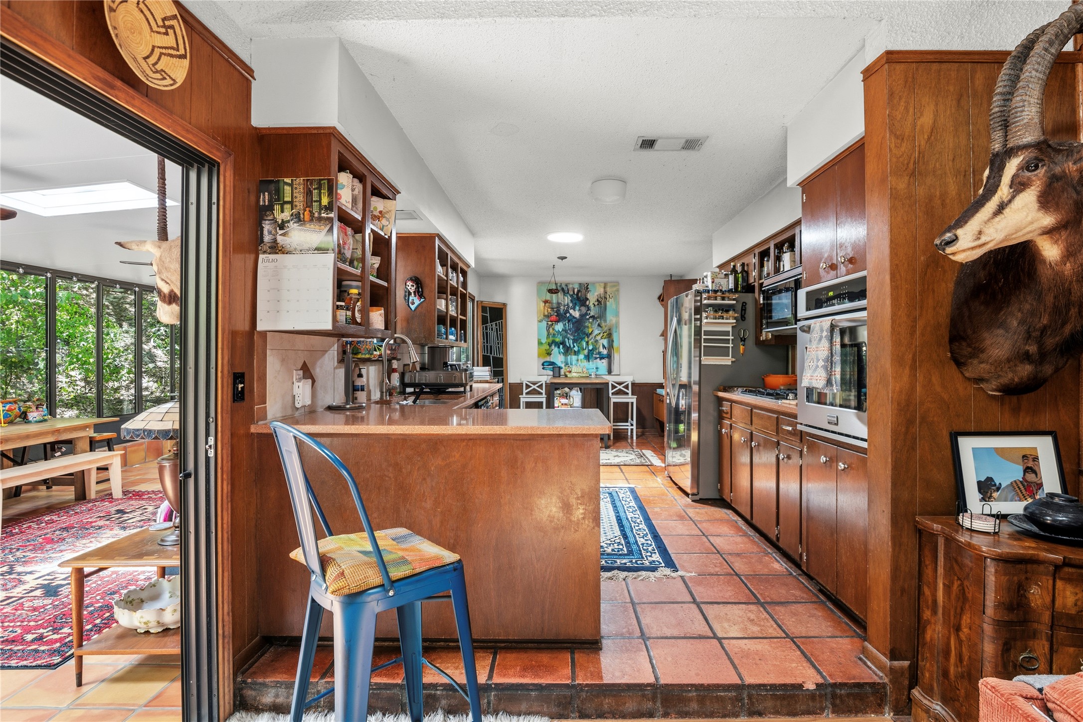 5403 Jeffburn Cove Austin, TX 78745 - Photo 13 of 40 a dining room with furniture and a flat screen tv