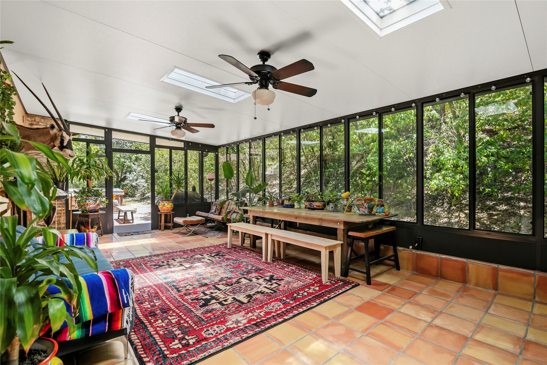 5403 Jeffburn Cove Austin, TX 78745 - Photo 19 of 40 a living room with furniture a rug and a large window