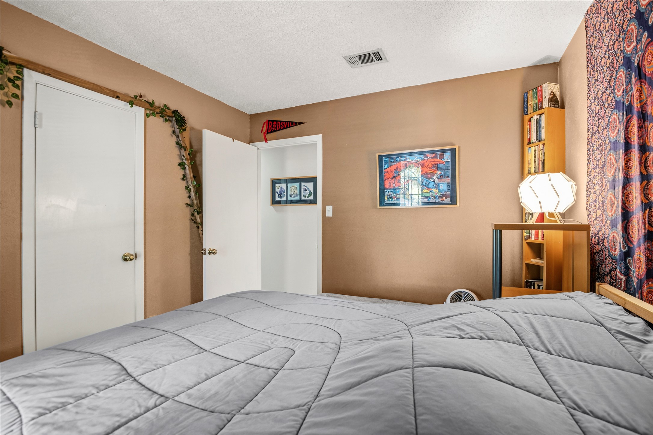 5403 Jeffburn Cove Austin, TX 78745 - Photo 30 of 40 a bedroom with a bed and a window