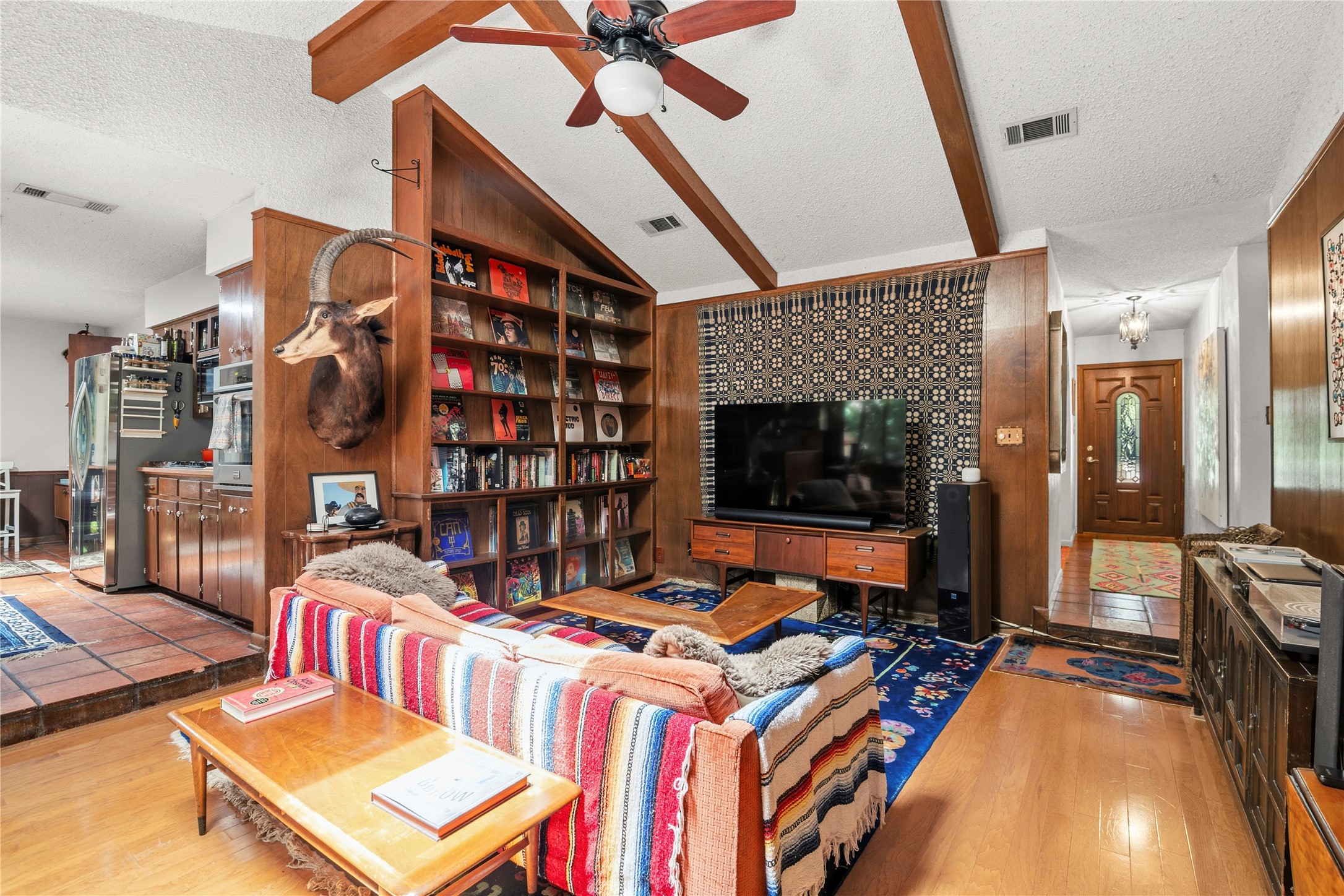 5403 Jeffburn Cove Austin, TX 78745 - Photo 4 of 40 a living room with lots of furniture and a flat screen tv