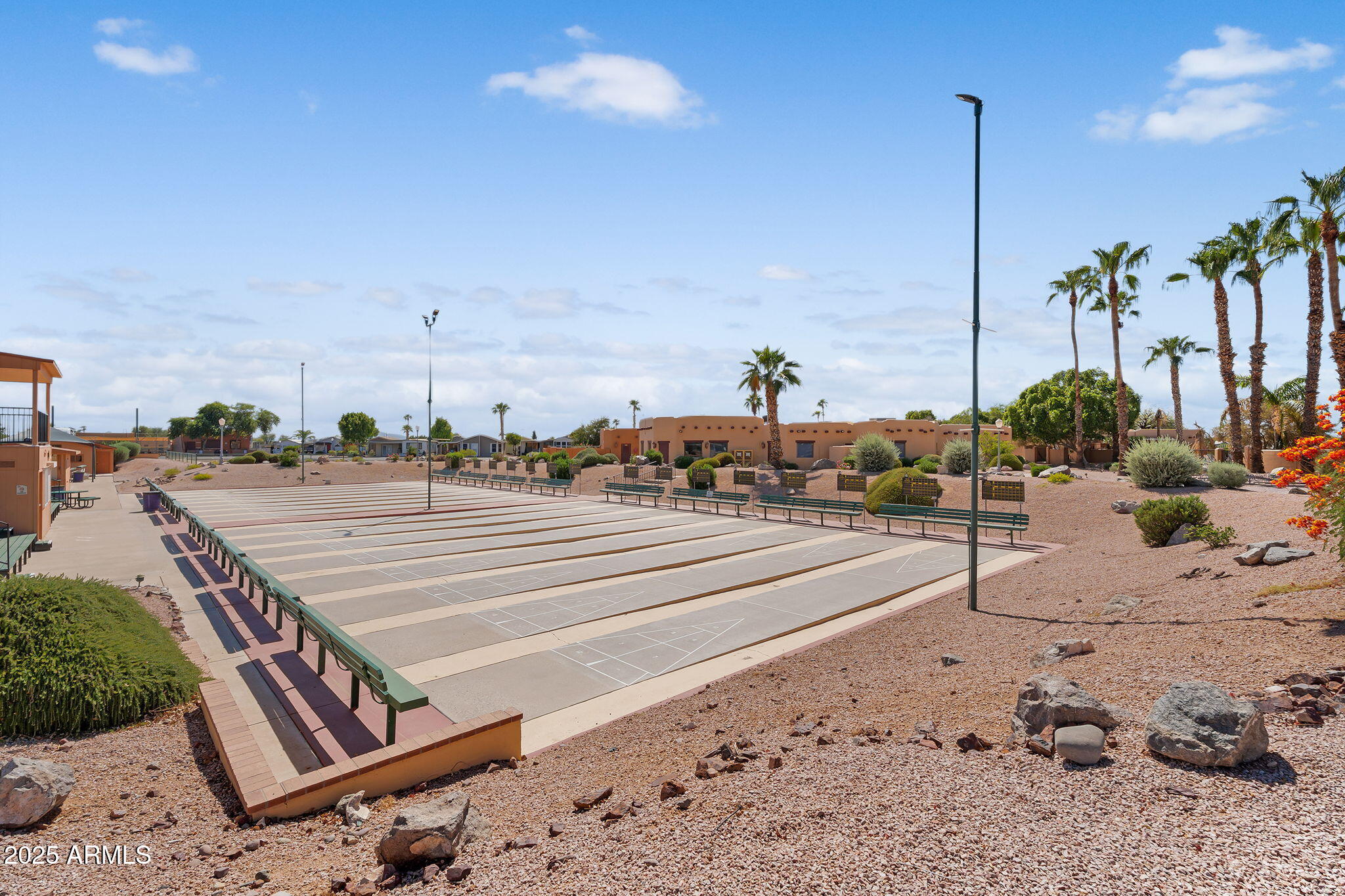 8865 East Baseline Road, Unit 802 Mesa, AZ 85209 - Photo 26 of 44 a view of a parking area