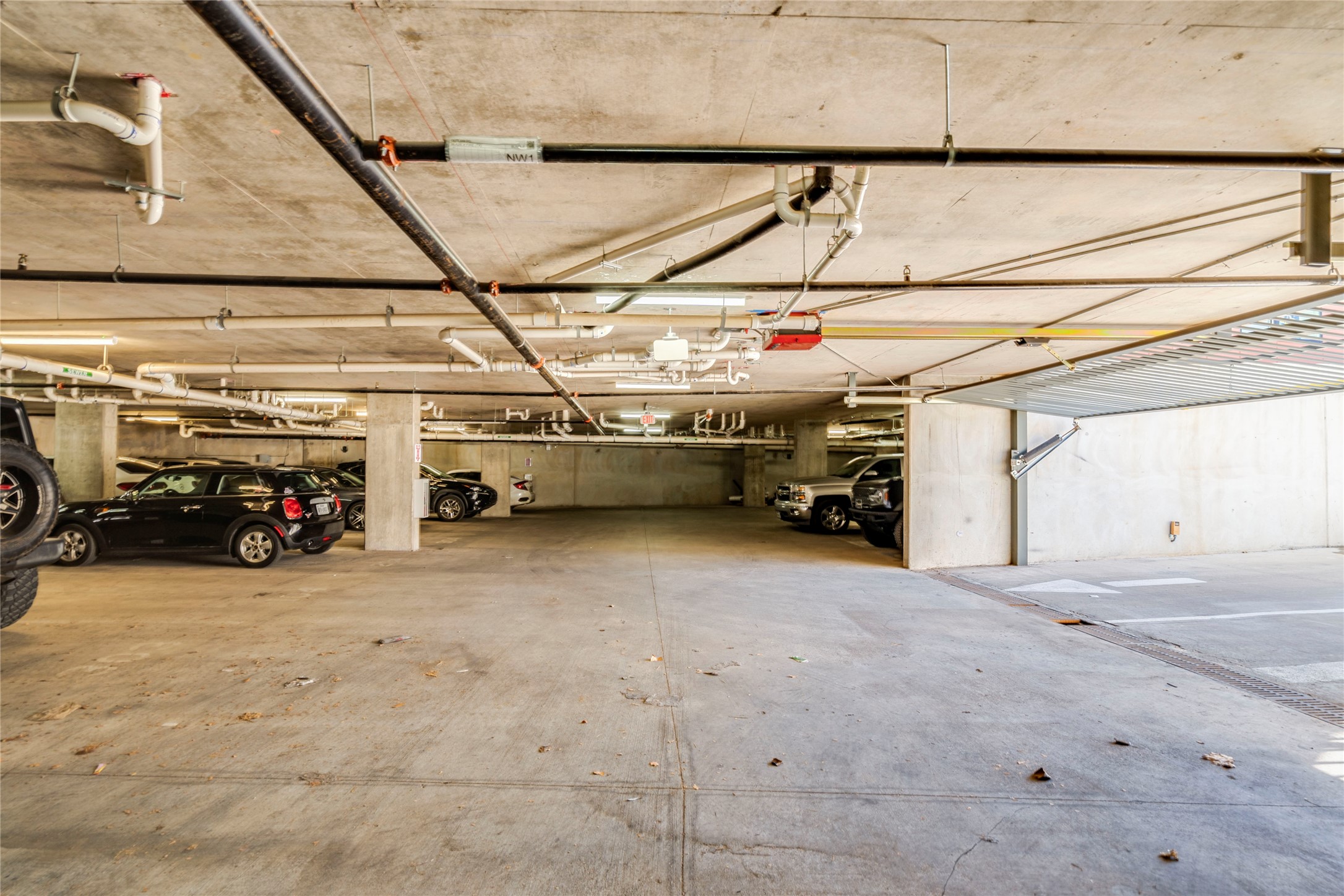 3000 Duval Street, Unit 207 Austin, TX 78705 - Photo 19 of 34 a view of parking garage with cars
