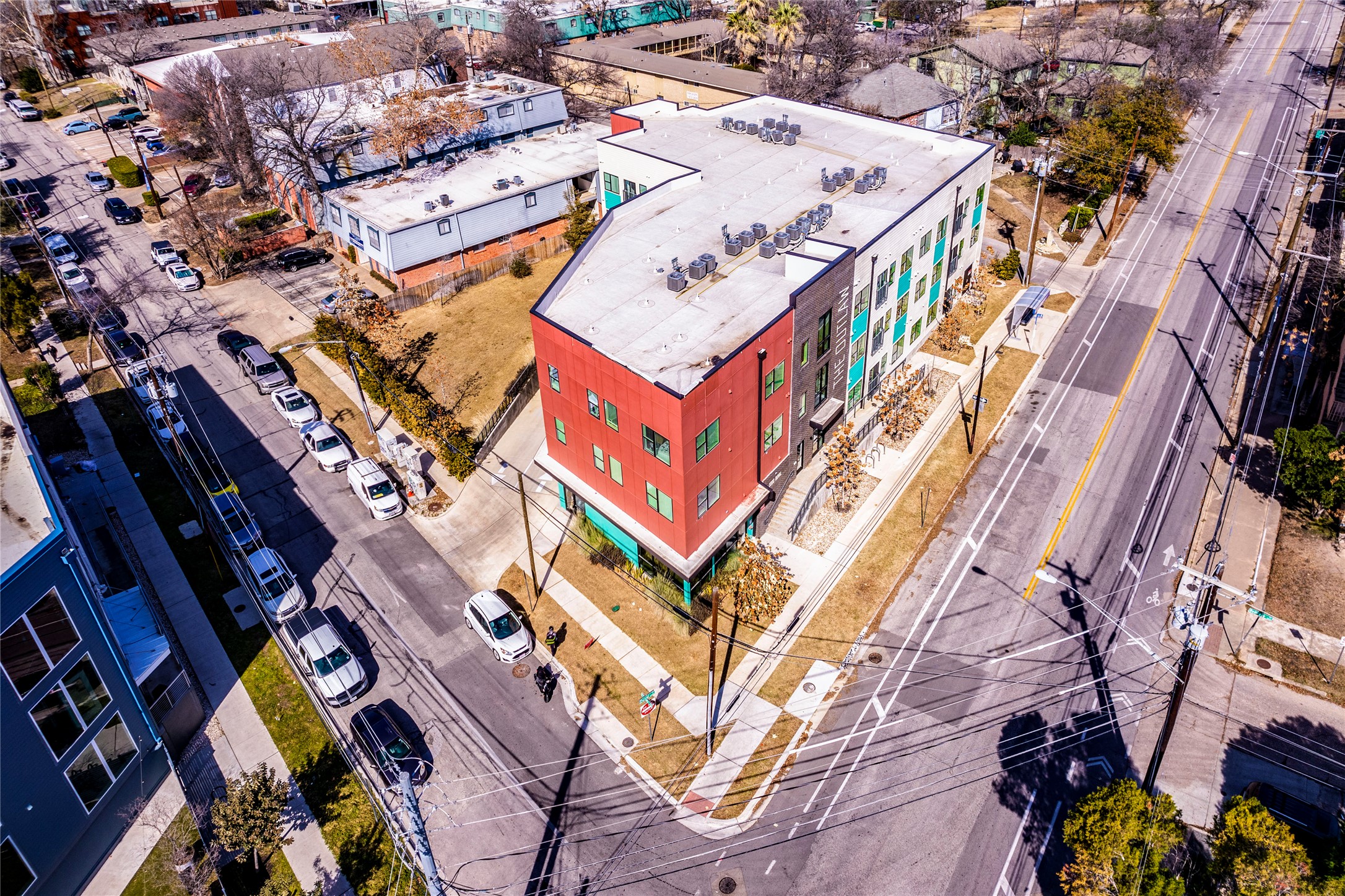 3000 Duval Street, Unit 207 Austin, TX 78705 - Photo 24 of 34 an aerial view of a building with a yard