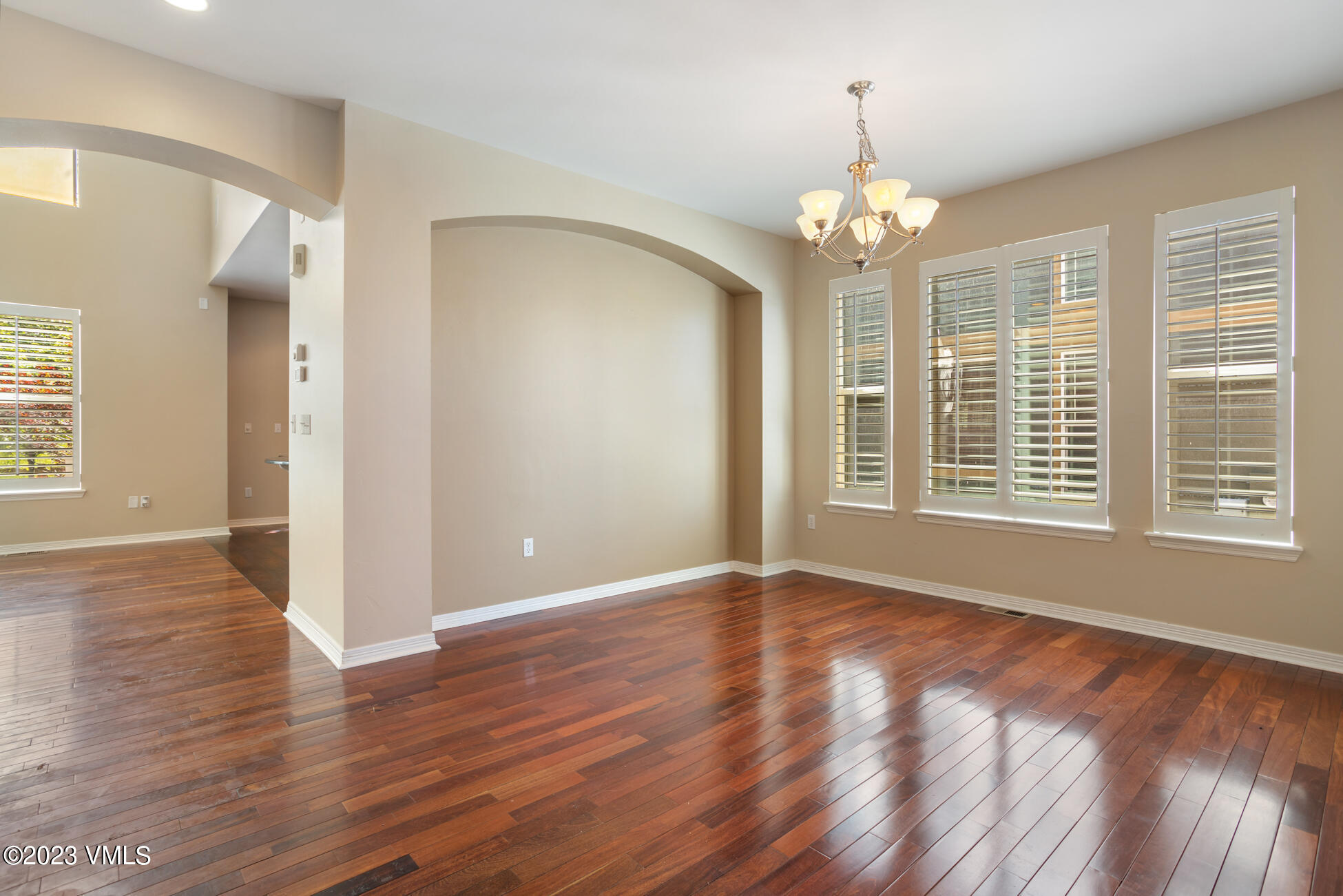 34 Greenhorn Avenue Eagle, CO 81631 - Photo 17 of 53 a view of an empty room with wooden floor and a window
