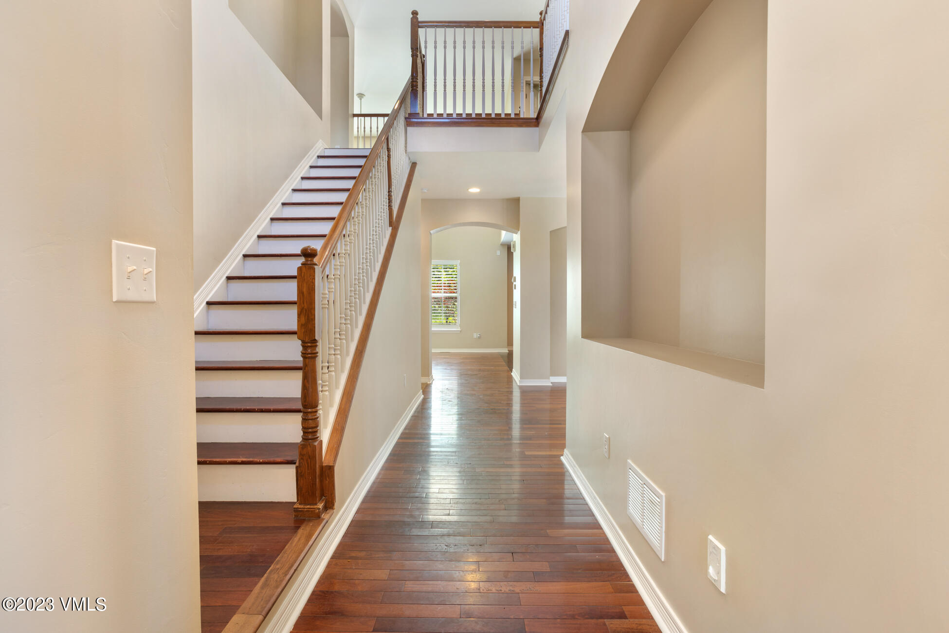 34 Greenhorn Avenue Eagle, CO 81631 - Photo 22 of 53 a view of a hallway with wooden floor and entryway