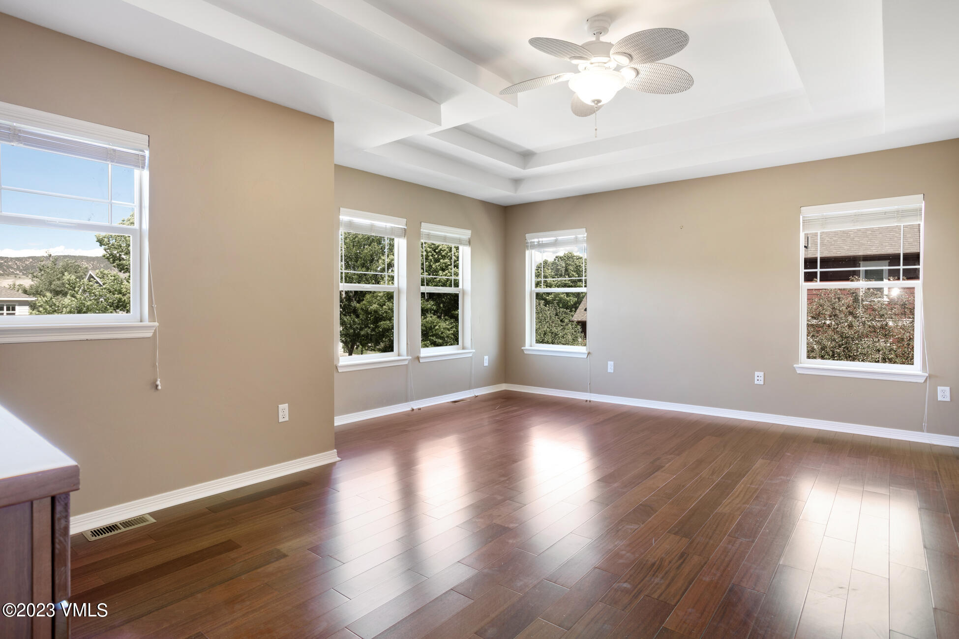 34 Greenhorn Avenue Eagle, CO 81631 - Photo 23 of 53 a view of an empty room with wooden floor and a window
