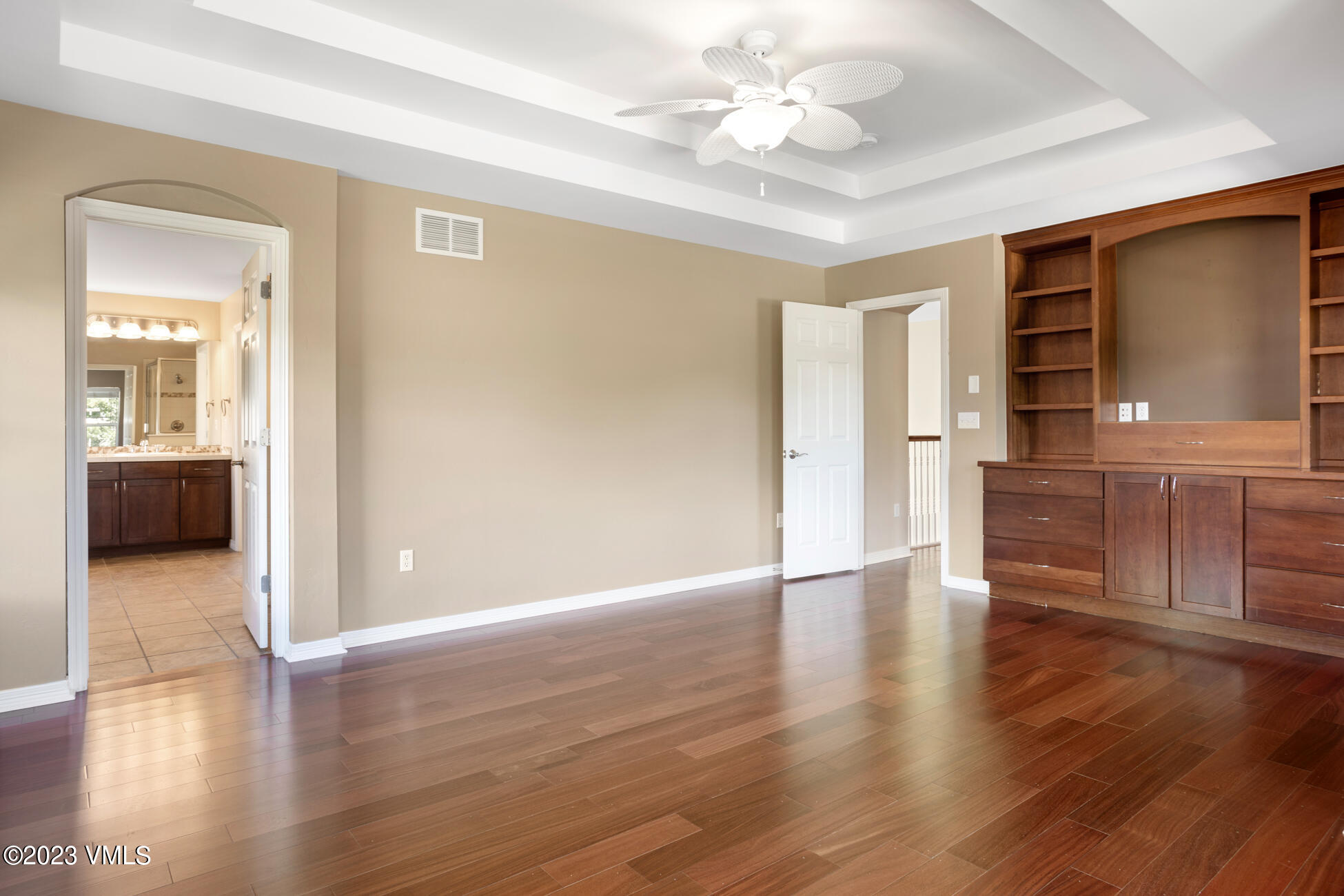 34 Greenhorn Avenue Eagle, CO 81631 - Photo 25 of 53 a view of an empty room with wooden floor and a window