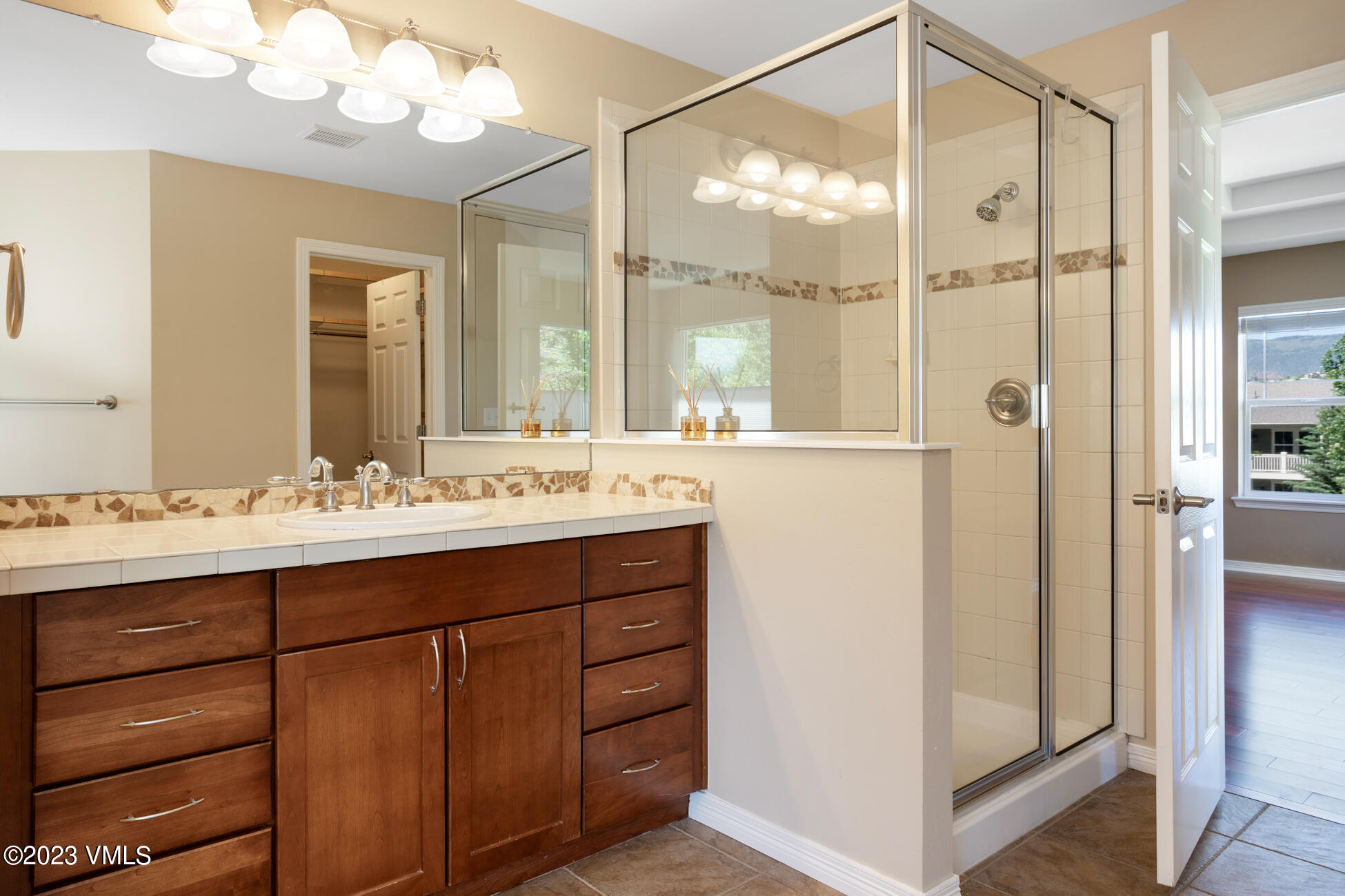 34 Greenhorn Avenue Eagle, CO 81631 - Photo 27 of 53 a bathroom with a double vanity sink mirror and double