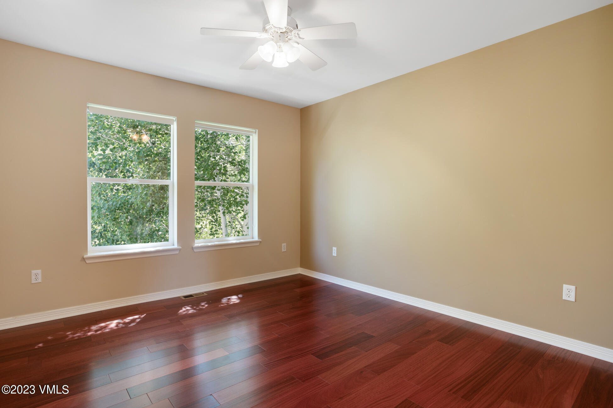 34 Greenhorn Avenue Eagle, CO 81631 - Photo 29 of 53 a view of an empty room with wooden floor and a window