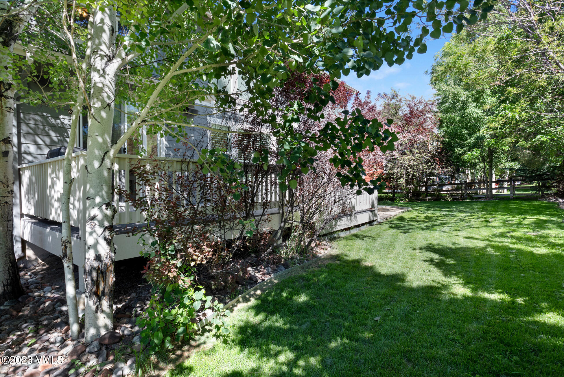 34 Greenhorn Avenue Eagle, CO 81631 - Photo 6 of 53 a backyard of a house with lots of green space
