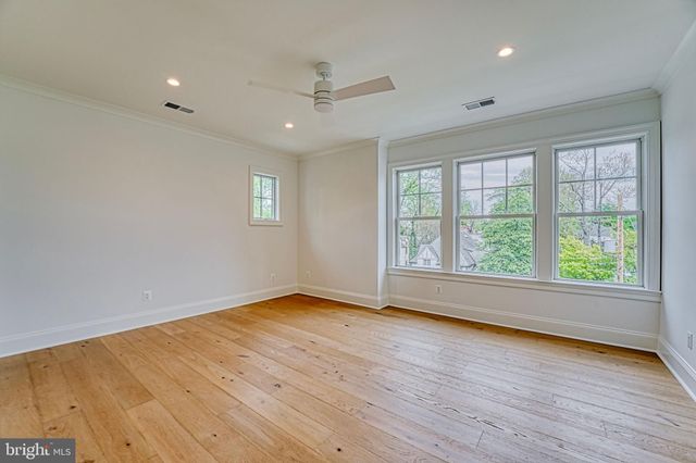 a kitchen with a sink and a refrigerator