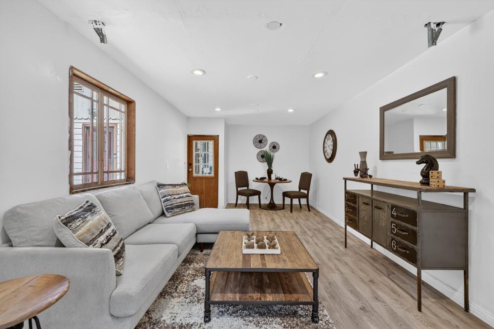2925 Maple Avenue Pollock Pines, CA 95726 - Photo 14 of 42 a living room with furniture and a wooden floor