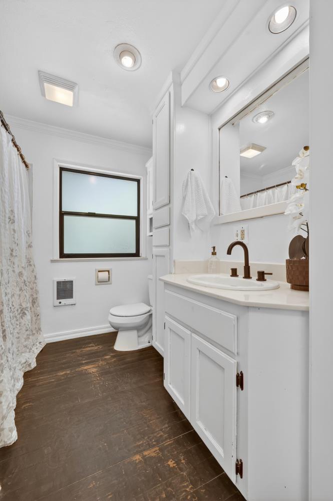 2925 Maple Avenue Pollock Pines, CA 95726 - Photo 31 of 42 a bathroom with a toilet sink and mirror