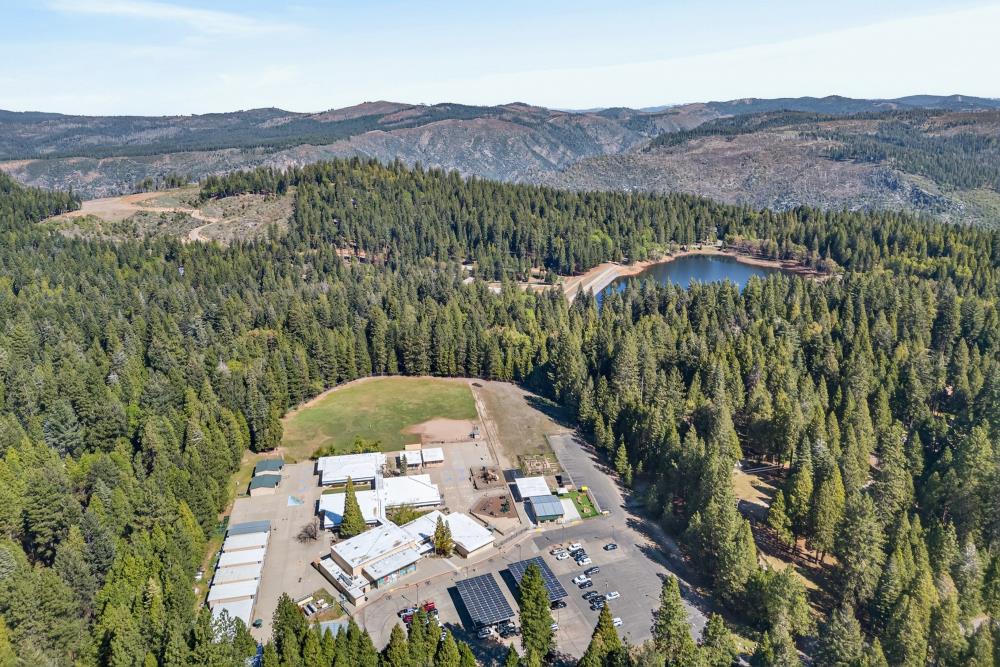2925 Maple Avenue Pollock Pines, CA 95726 - Photo 41 of 42 an aerial view of a house with mountain view