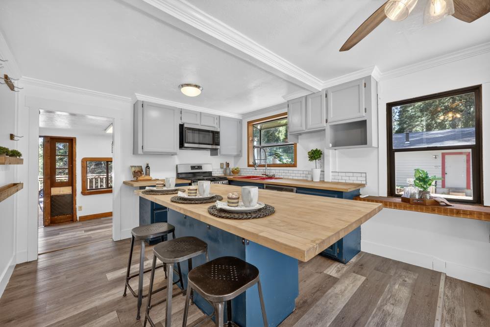 2925 Maple Avenue Pollock Pines, CA 95726 - Photo 7 of 42 a kitchen with a stove and a refrigerator