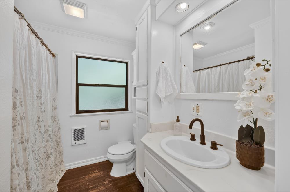 2925 Maple Avenue Pollock Pines, CA 95726 - Photo 9 of 42 a bathroom with a toilet sink and mirror