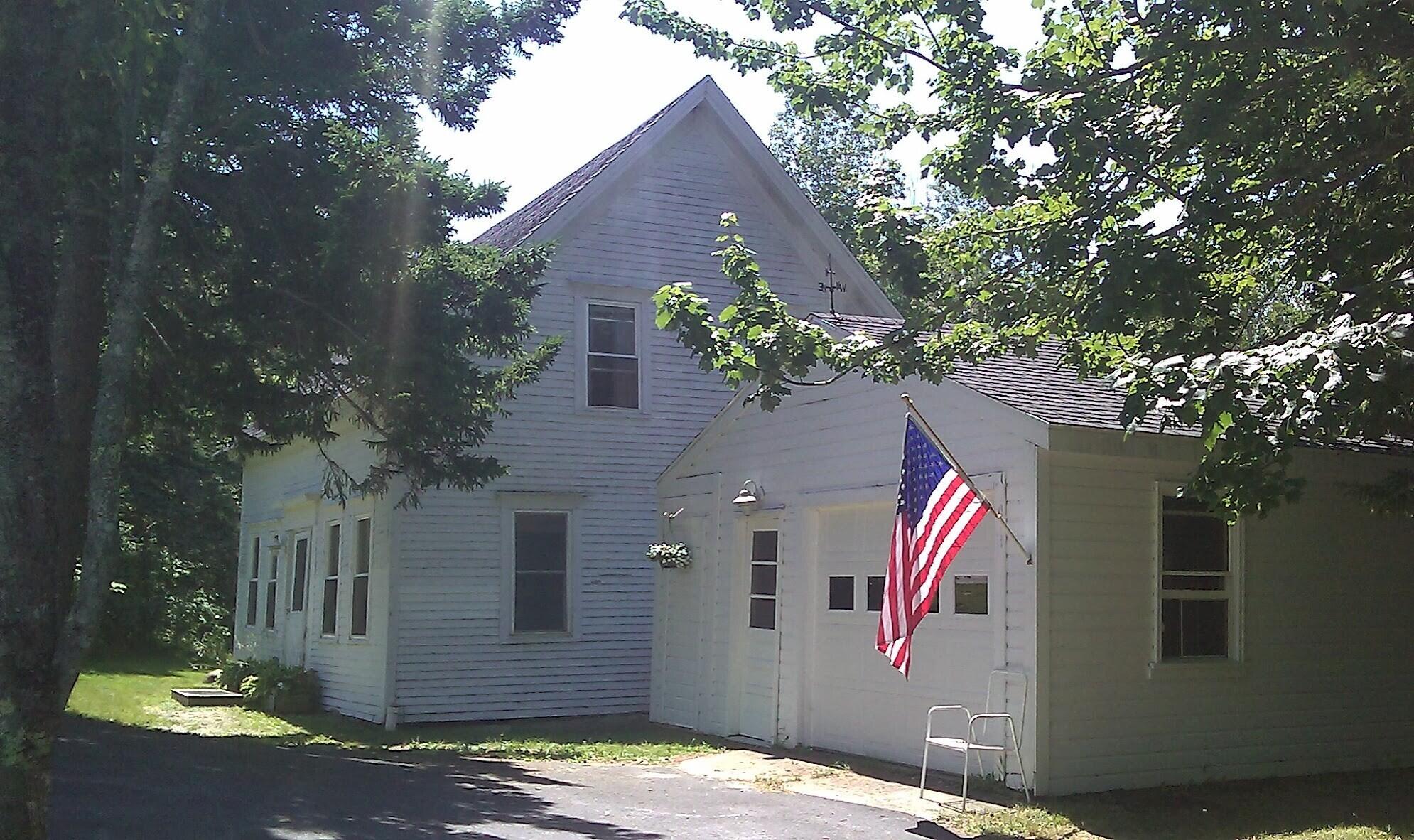 743 South Gouldsboro Road Gouldsboro, ME 04607 - Photo 2 of 38 Garage and house from circular driveway.