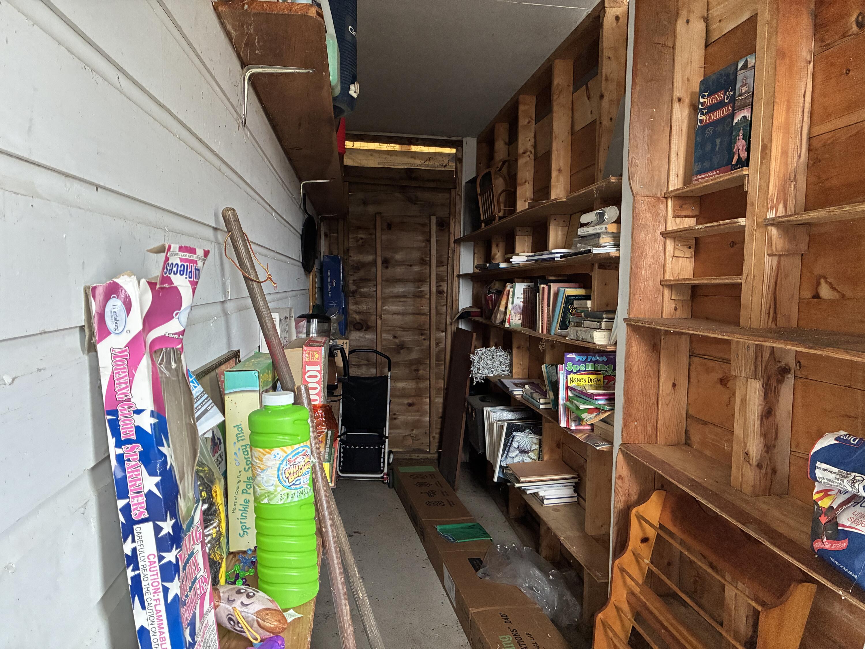 743 South Gouldsboro Road Gouldsboro, ME 04607 - Photo 30 of 38 Temporary wall in garage, storage area.