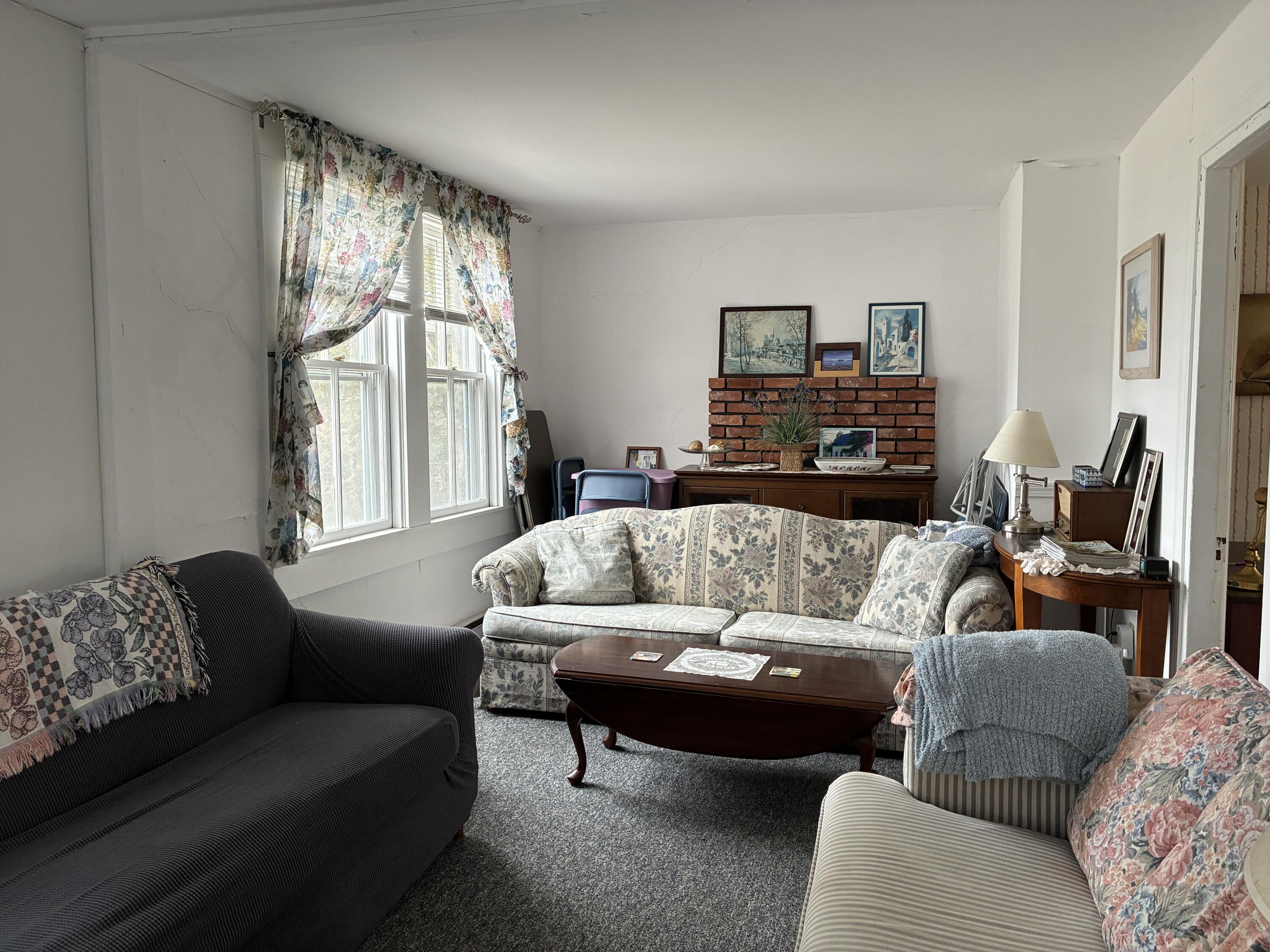 743 South Gouldsboro Road Gouldsboro, ME 04607 - Photo 6 of 38 Living room with long views.