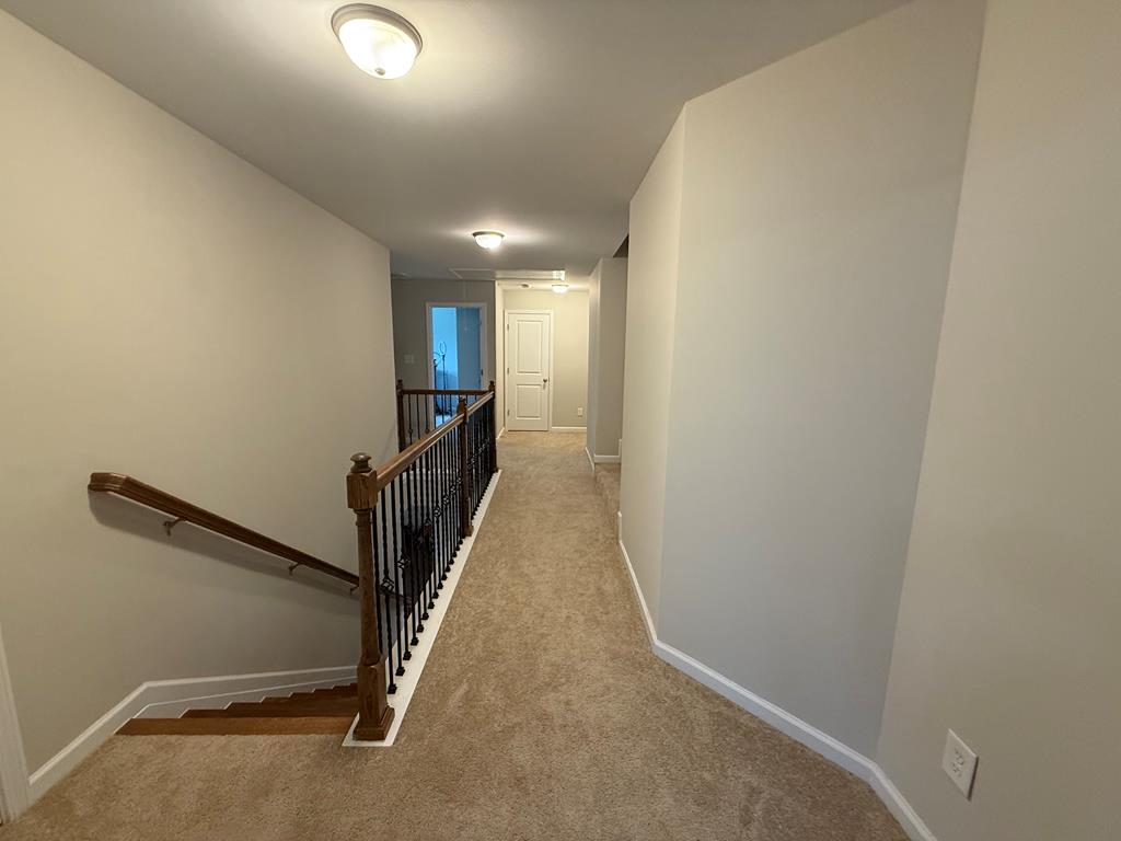 57 Hart Ridge Court Fortson, GA 31808 - Photo 17 of 38 a view of a hallway with stairs
