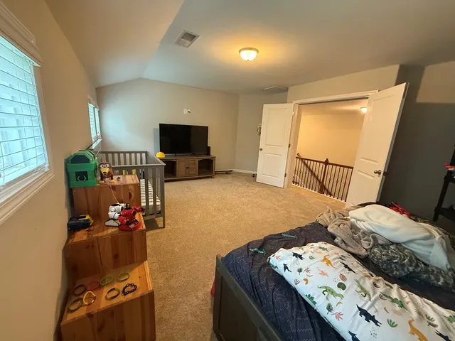 a view of a kitchen from the hallway