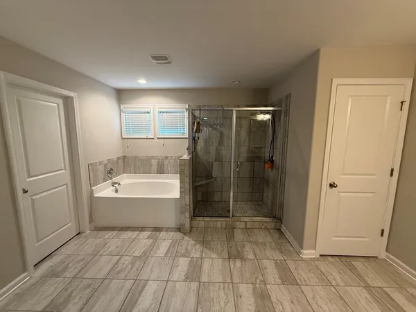 a bathroom with a mirror and a sink