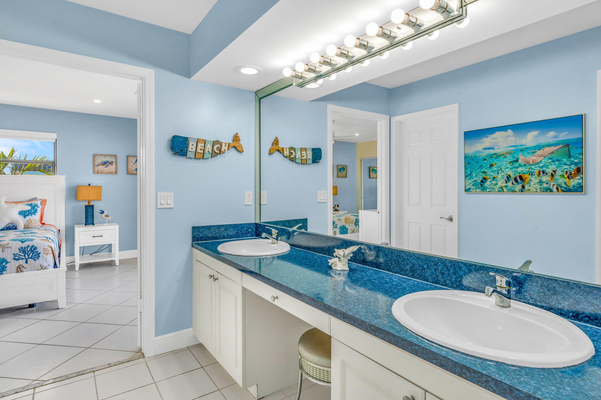 33 Kyle Way West Marathon, FL 33050 - Photo 20 of 44 a bathroom with a granite countertop double vanity sink and a mirror