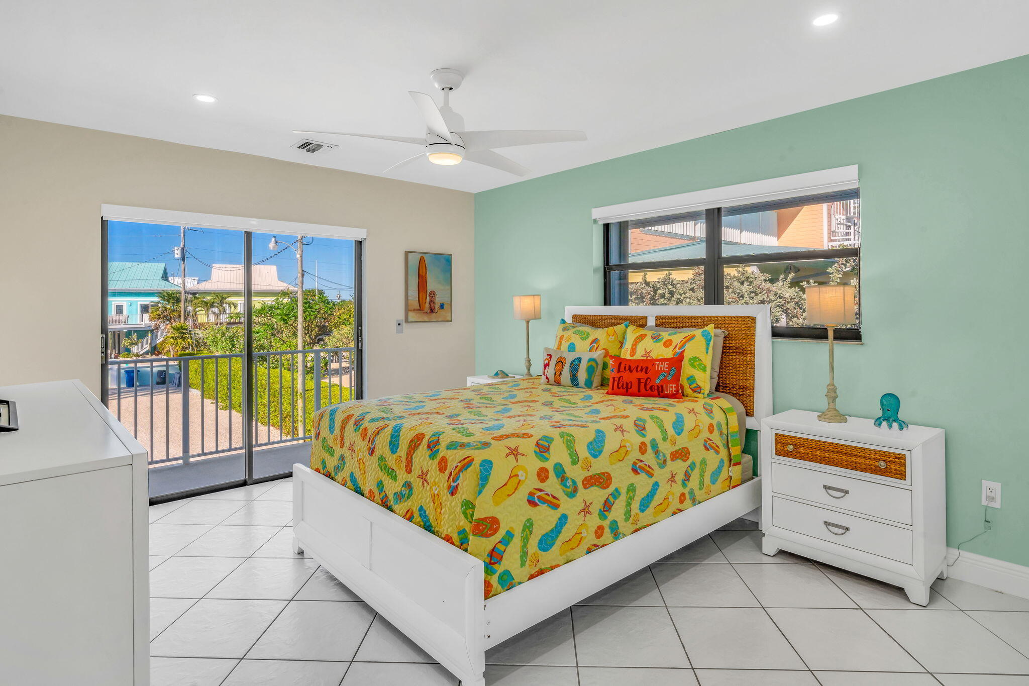 33 Kyle Way West Marathon, FL 33050 - Photo 21 of 44 a bed room with a bed and a baby crib