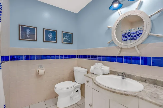 a view of outside space with wooden floor and ocean view