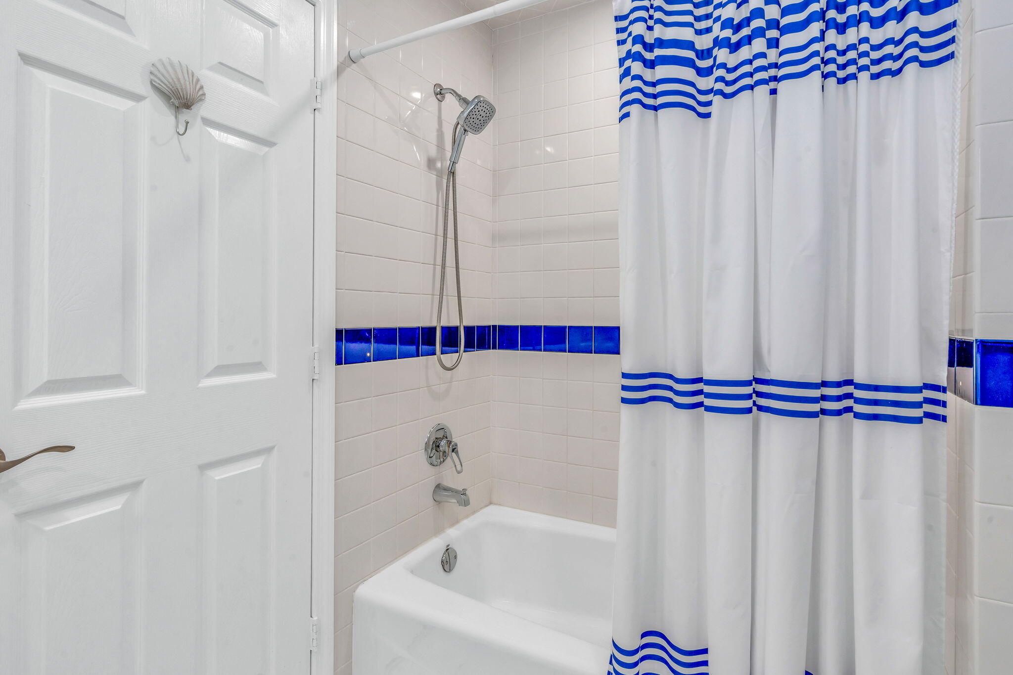 33 Kyle Way West Marathon, FL 33050 - Photo 24 of 44 a bathroom with a bathtub and a shower